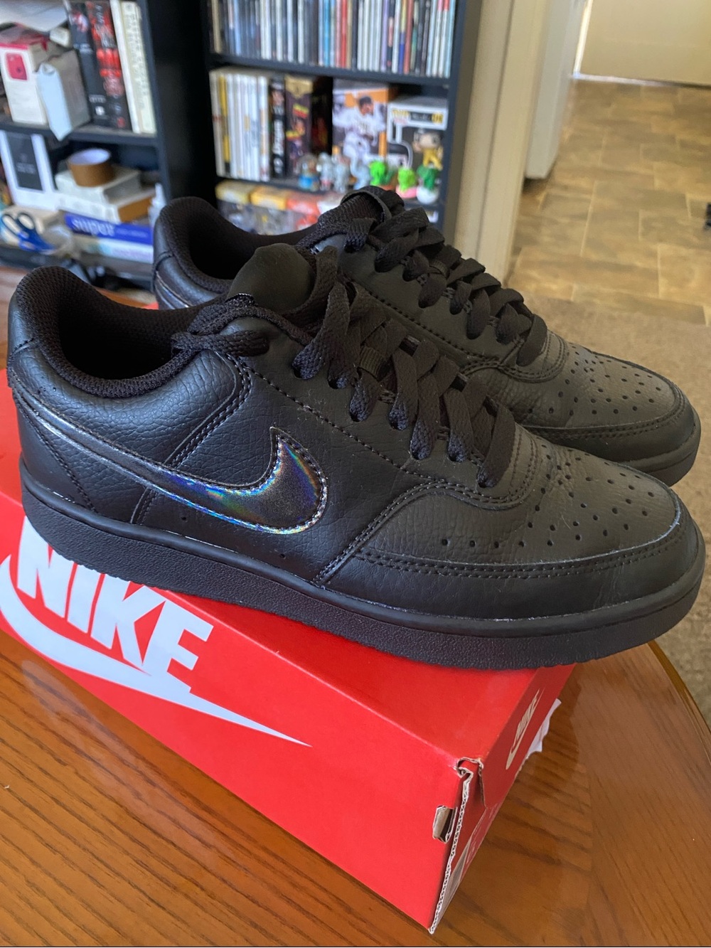Nike Black Low-Top Sneakers with Iridescent Swoosh Accent